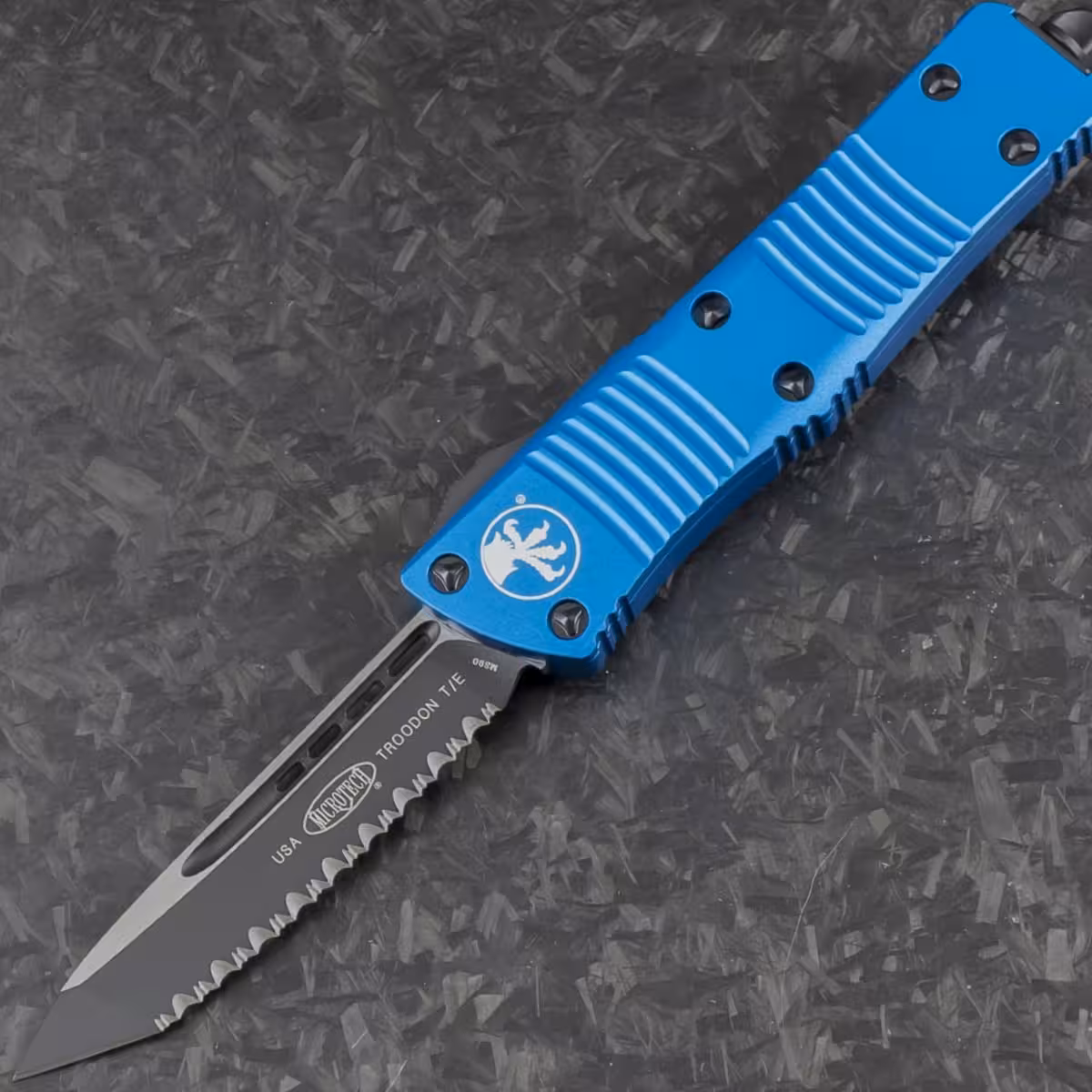 _140-3BL_Microtech_Blue_Troodon_TE_Black_Full_Serrated_-_Front
